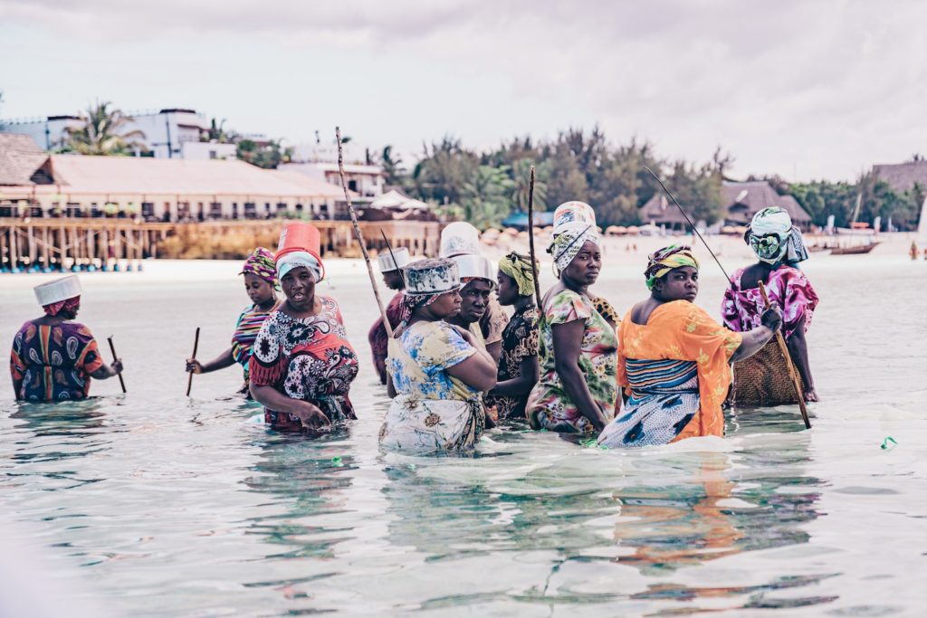 People In Body Of Water